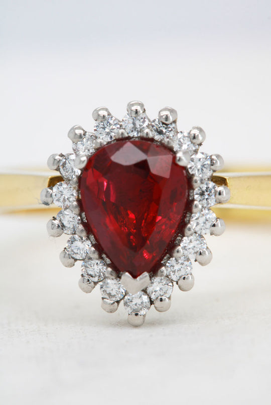 Natural Ruby and Diamond Halo Ring