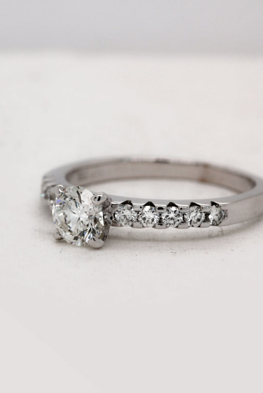 White Gold Solitaire Ring with Shoulder Diamonds
