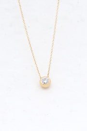 Bezel set diamond pendant