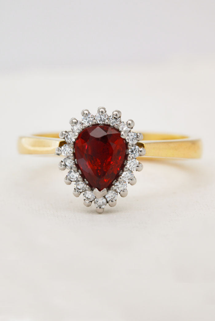 Natural Ruby and Diamond Halo Ring