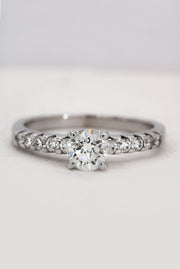 White Gold Solitaire Ring with Shoulder Diamonds