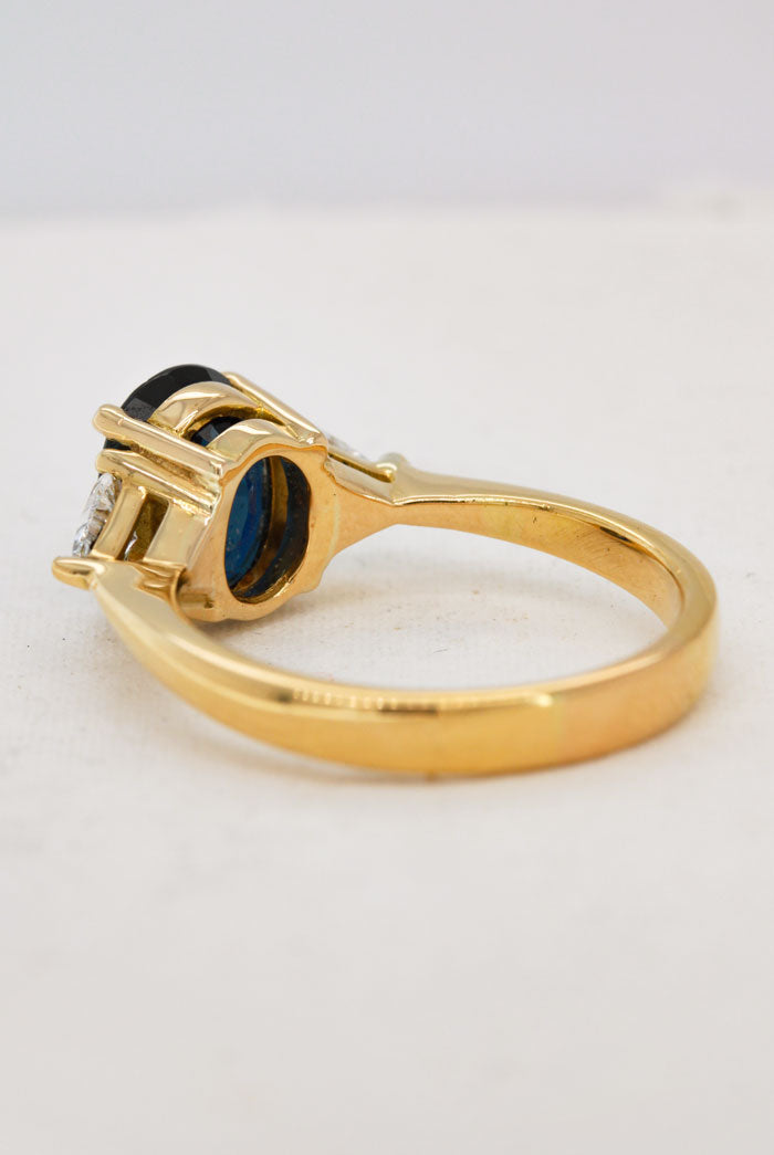 Oval Sapphire Ring with Diamond Trilliants