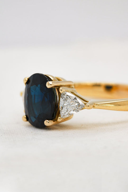 Oval Sapphire Ring with Diamond Trilliants